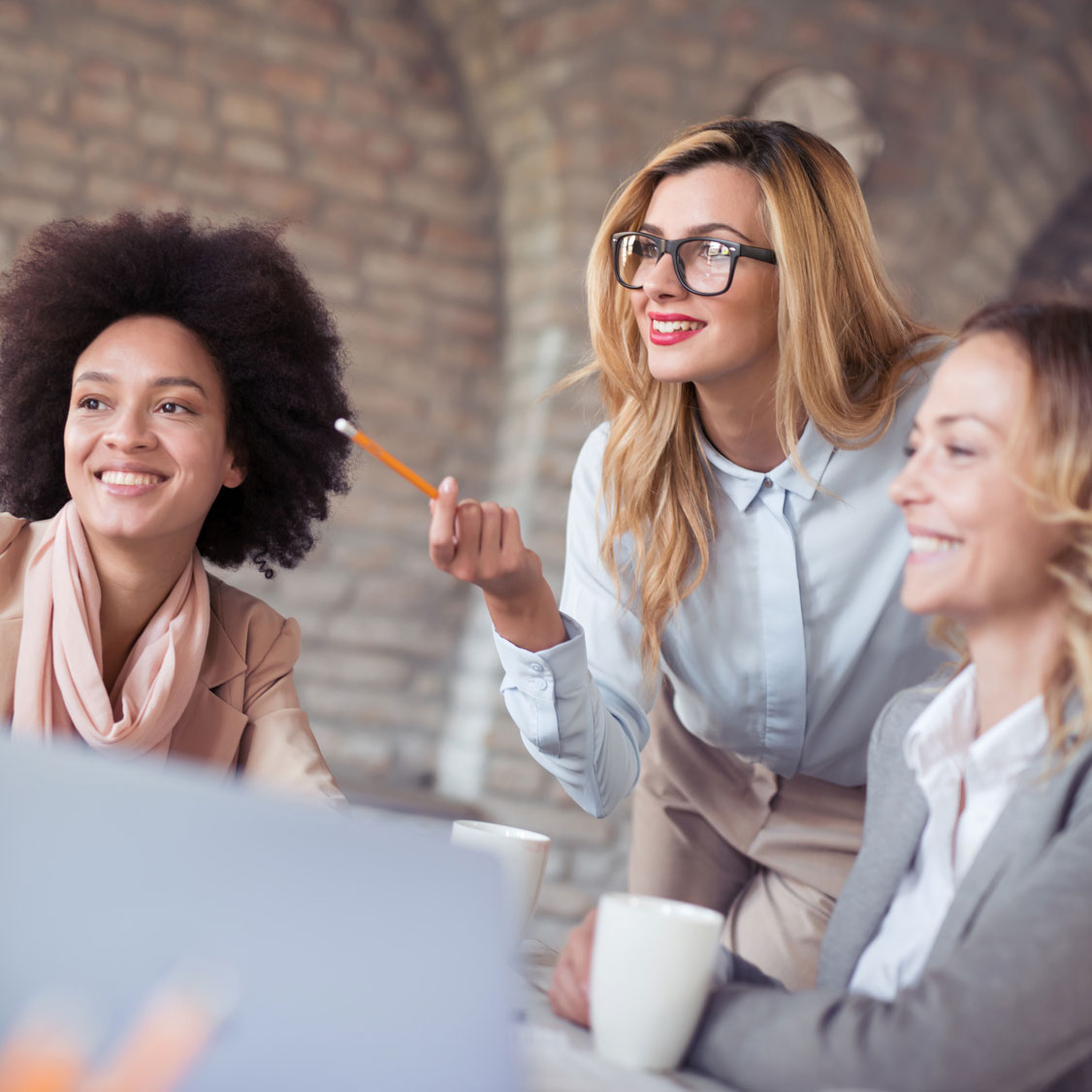 Three young women discussing the ARMS Donor Egg Programs | Arizona Reproductive Medical Specialists