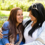 Mother and daughter smiling |What it Means to be a Mother
