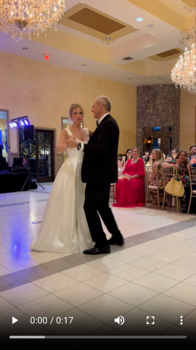 Dr. Moffitt dances with his daughter at her wedding