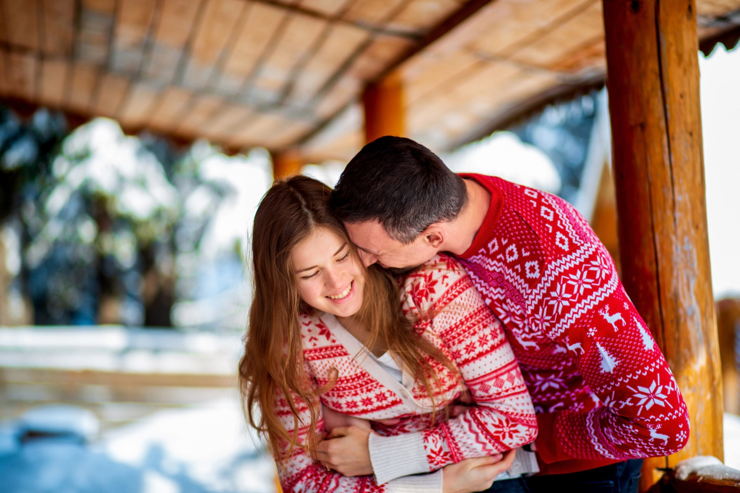 Couple embracing after receiving positive results from the ovulation test | Arizona Reproductive Medical Specialists