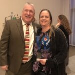 Amber Brewer being presented her DEB USA award