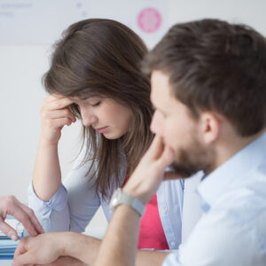 Woeful marriage suffering from infertility visiting gynecologist