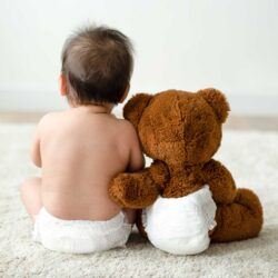 Baby with teddy bear