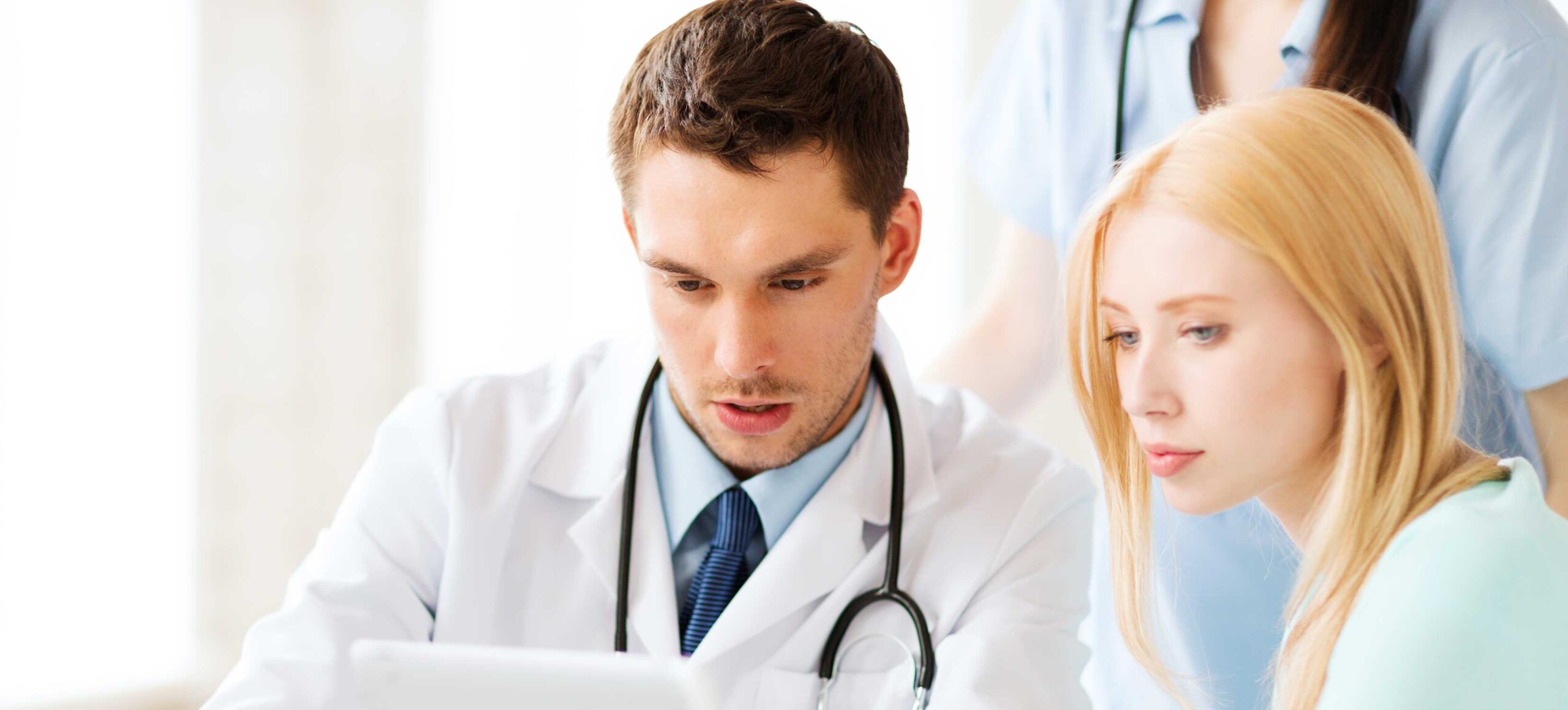 Woman discussing endometriosis with doctor | Arizona Reproductive Medicine Specialists